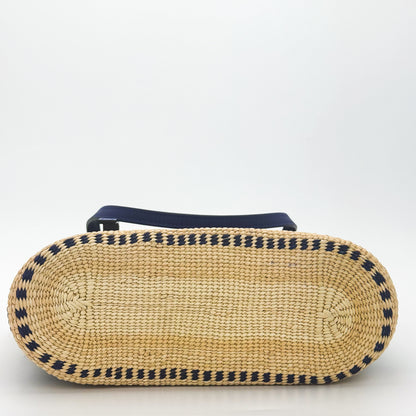 Loewe x Paula's Ibiza Square Basket Bag in striped raffia with cobalt blue leather handles — bottom view
