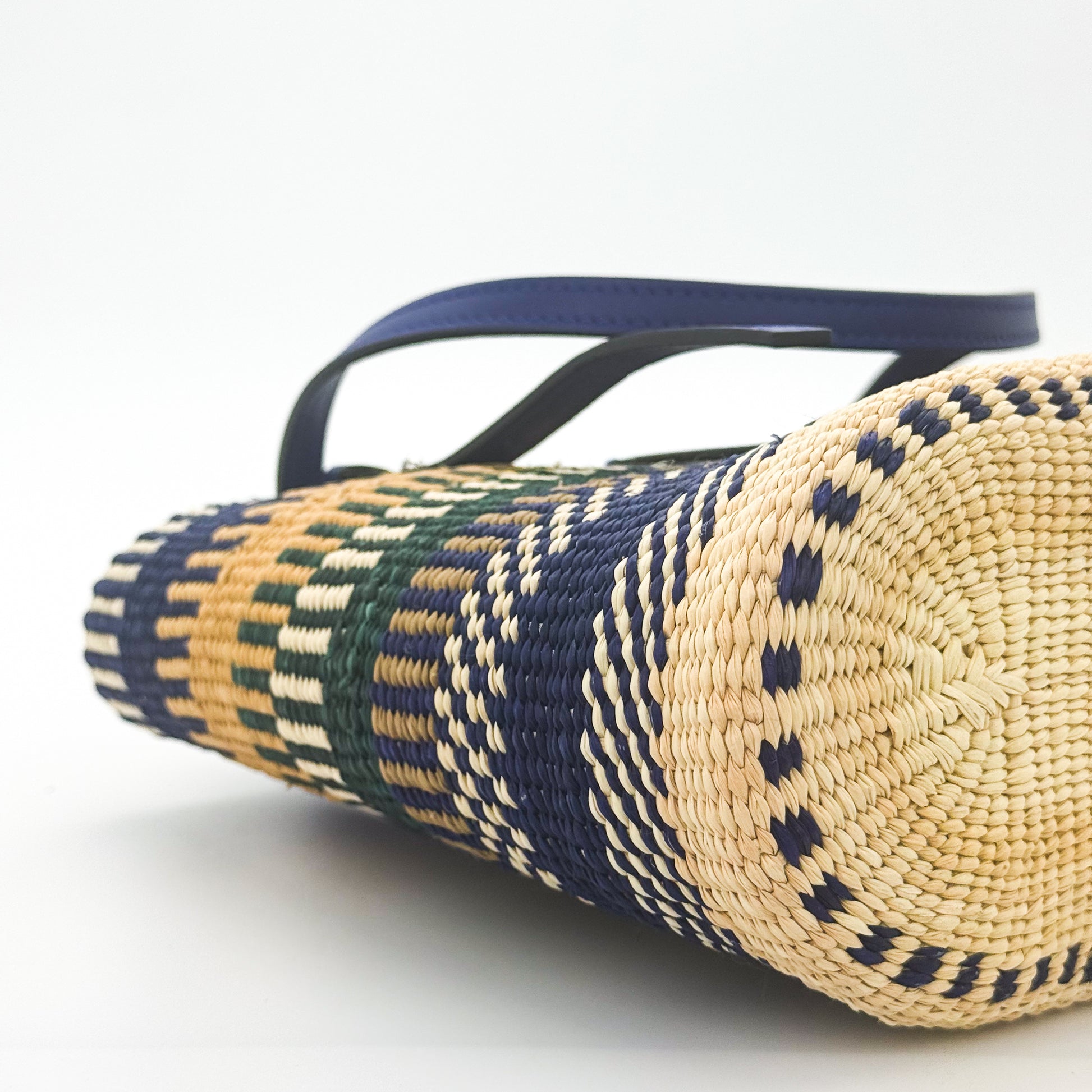 Loewe x Paula's Ibiza Square Basket Bag in striped raffia with cobalt blue leather handles — side view