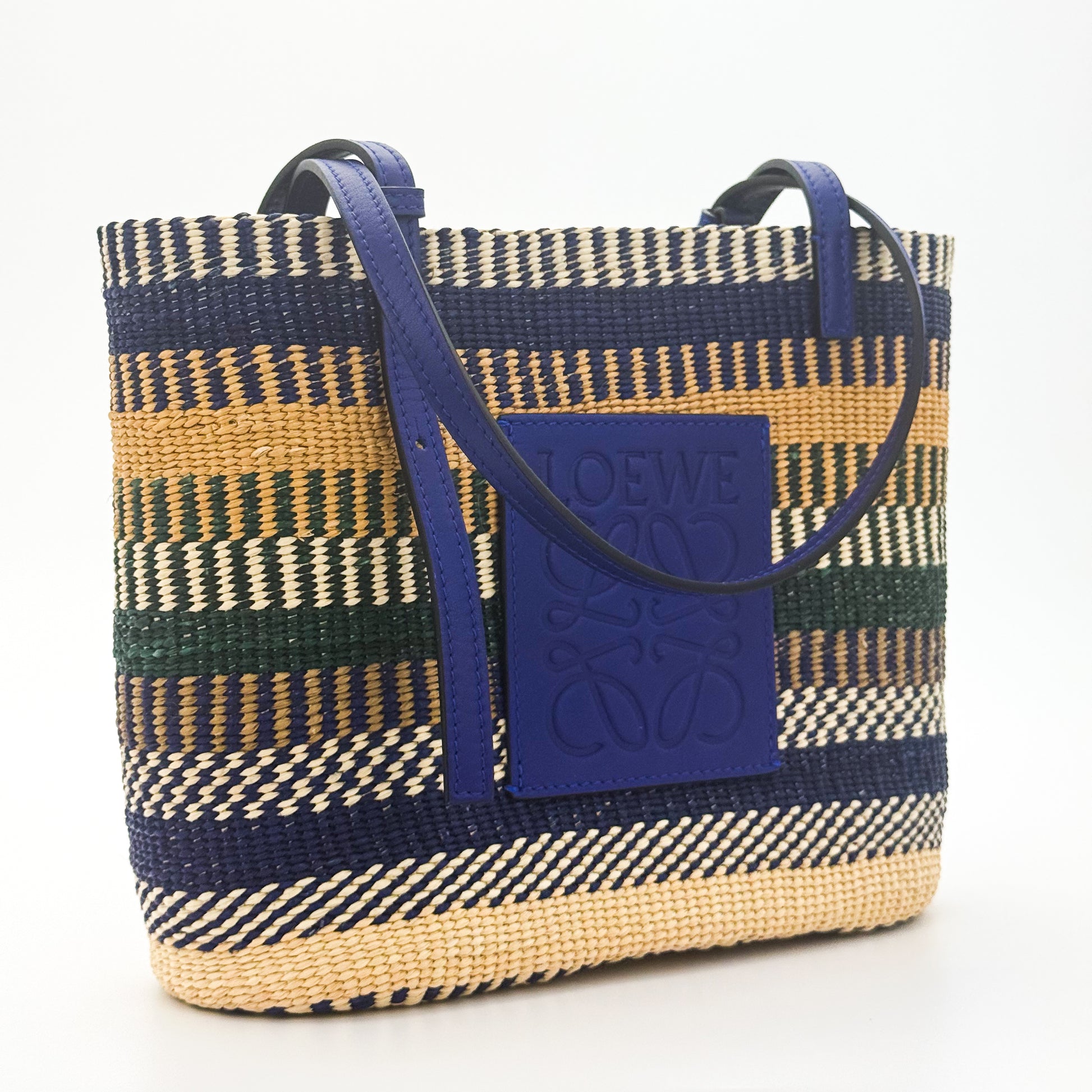 Loewe x Paula's Ibiza Square Basket Bag in striped raffia with cobalt blue leather handles — front view