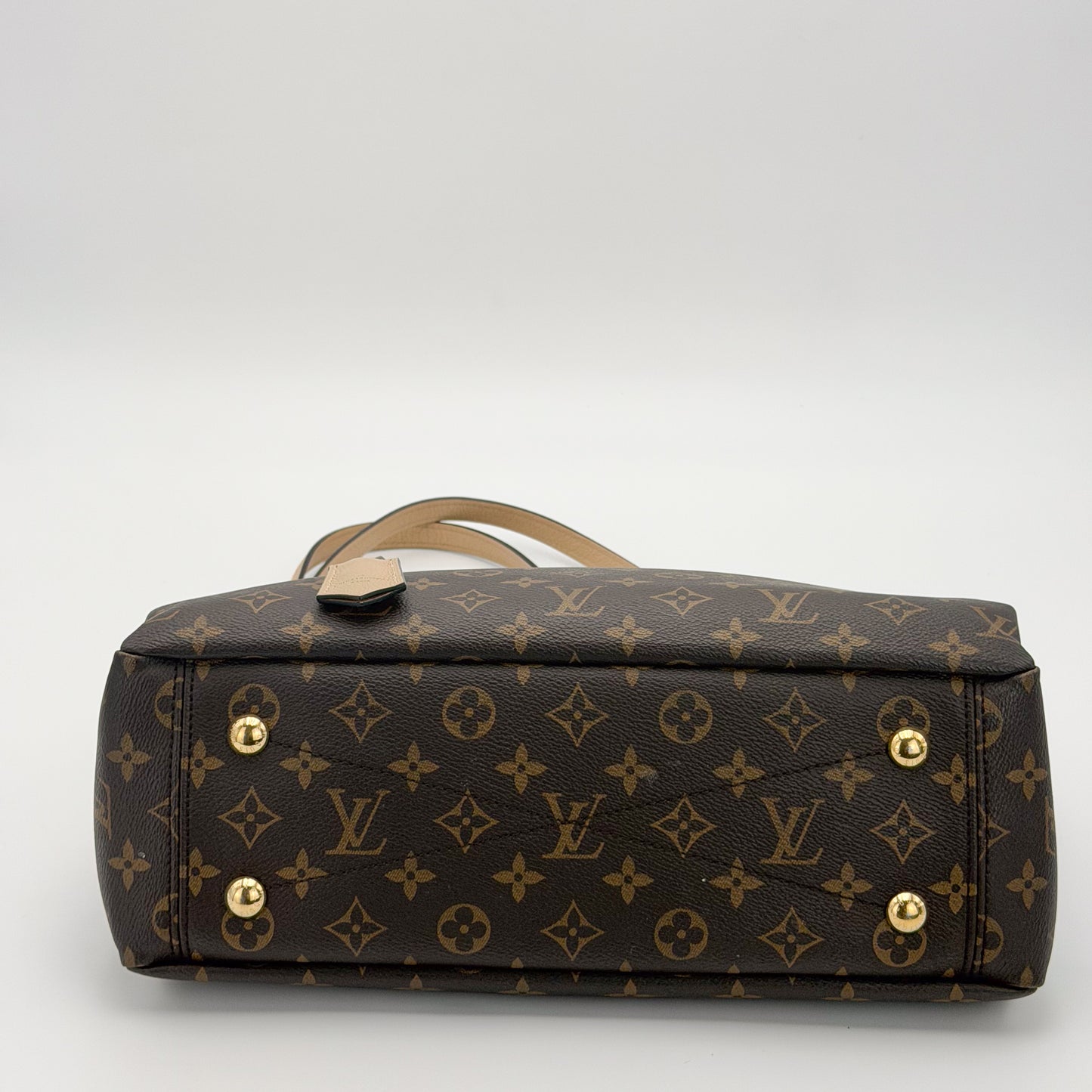 Preloved Louis Vuitton Pallas Shopper tote base view showing gold hardware studs