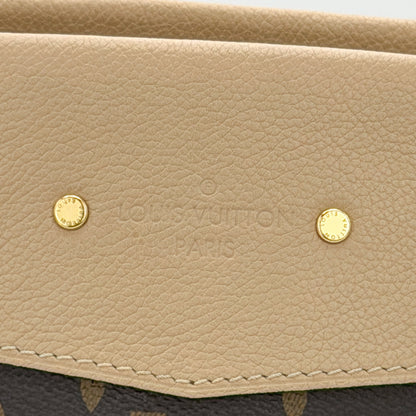Preloved Louis Vuitton Pallas Shopper tote front view showing Dune leather trim