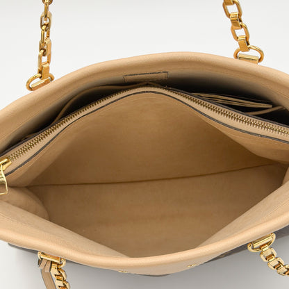 Preloved Louis Vuitton Pallas Shopper interior view with beige lining and zip pocket