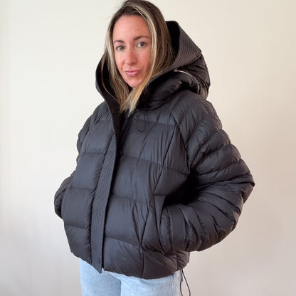 Nike puffer jacket — back view showing swoosh logo