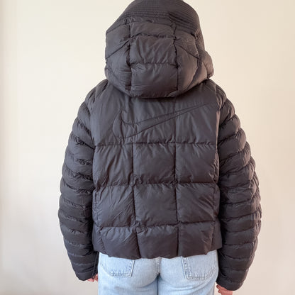 Nike puffer jacket — back view showing swoosh logo