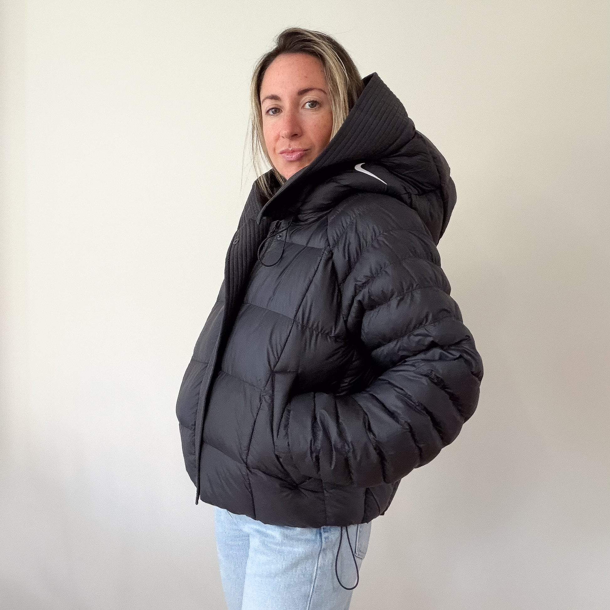Nike hooded puffer — side/back angled view