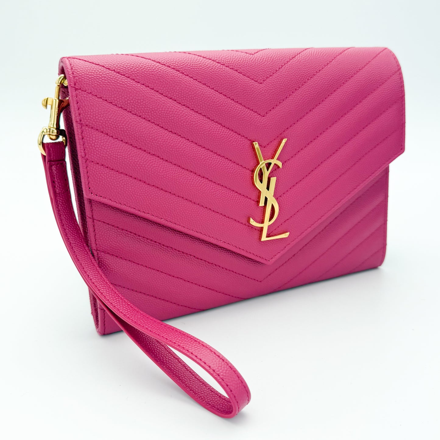 Used Saint Laurent Cassandre flap pouch Fuxia Couture pink gold YSL monogram angled side view