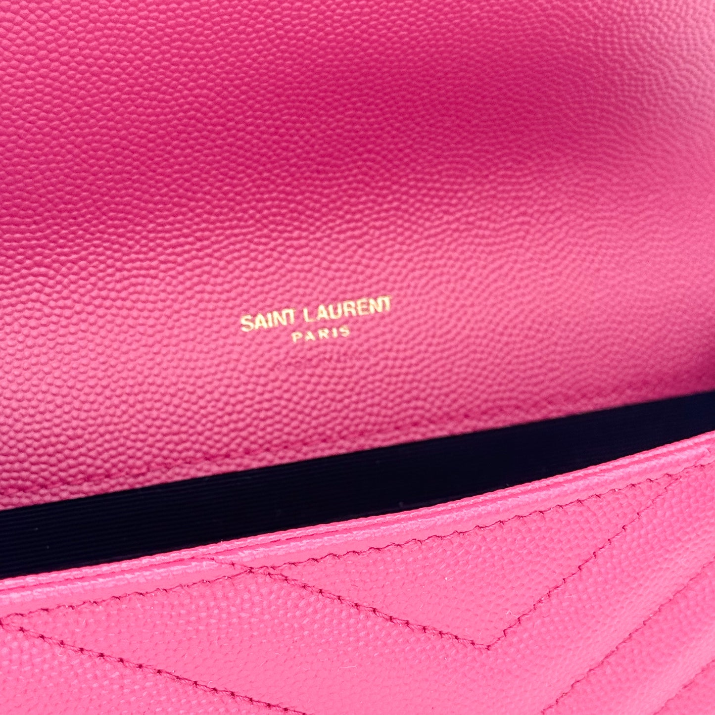 Preloved YSL Cassandre wristlet Fuxia Couture pink gold Saint Laurent interior stamp