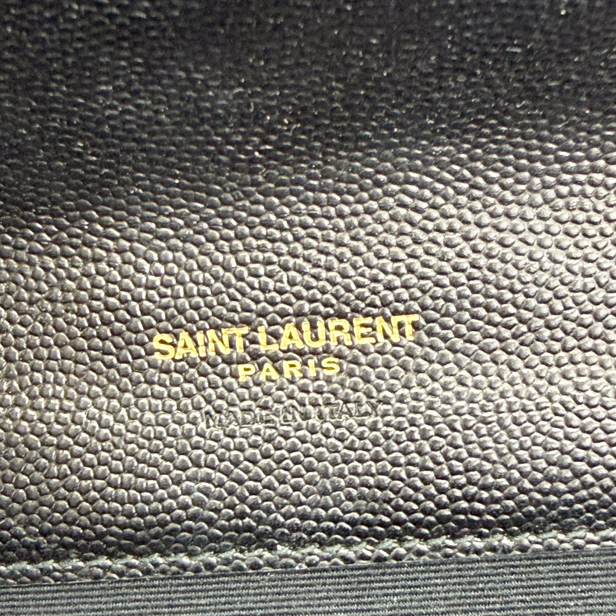 Saint Laurent Cassandre Matelassé Flap Pouch – interior stamp