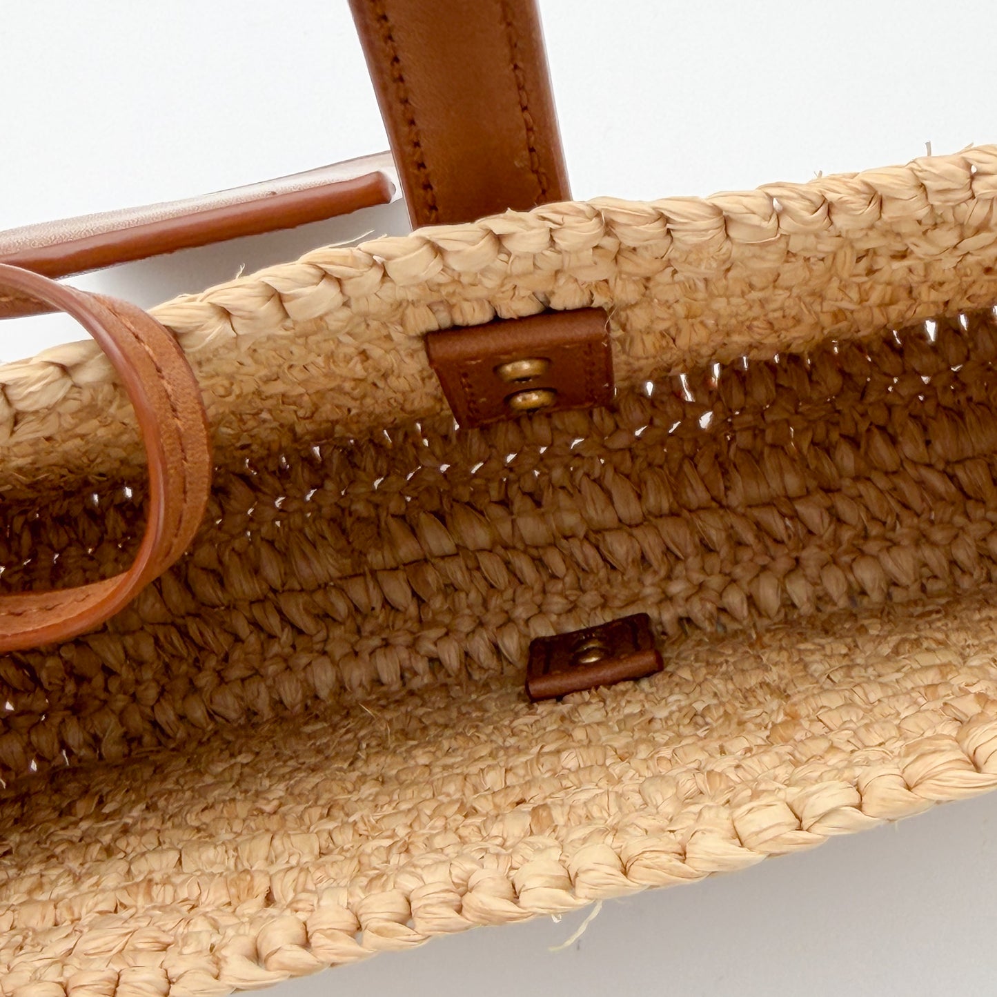 Saint Laurent raffia hobo bag interior view and tan strap 