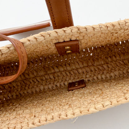 Saint Laurent raffia hobo bag interior view and tan strap 