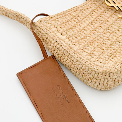 Saint Laurent leather tag close up stamped Made in Madagascar authenticity detail