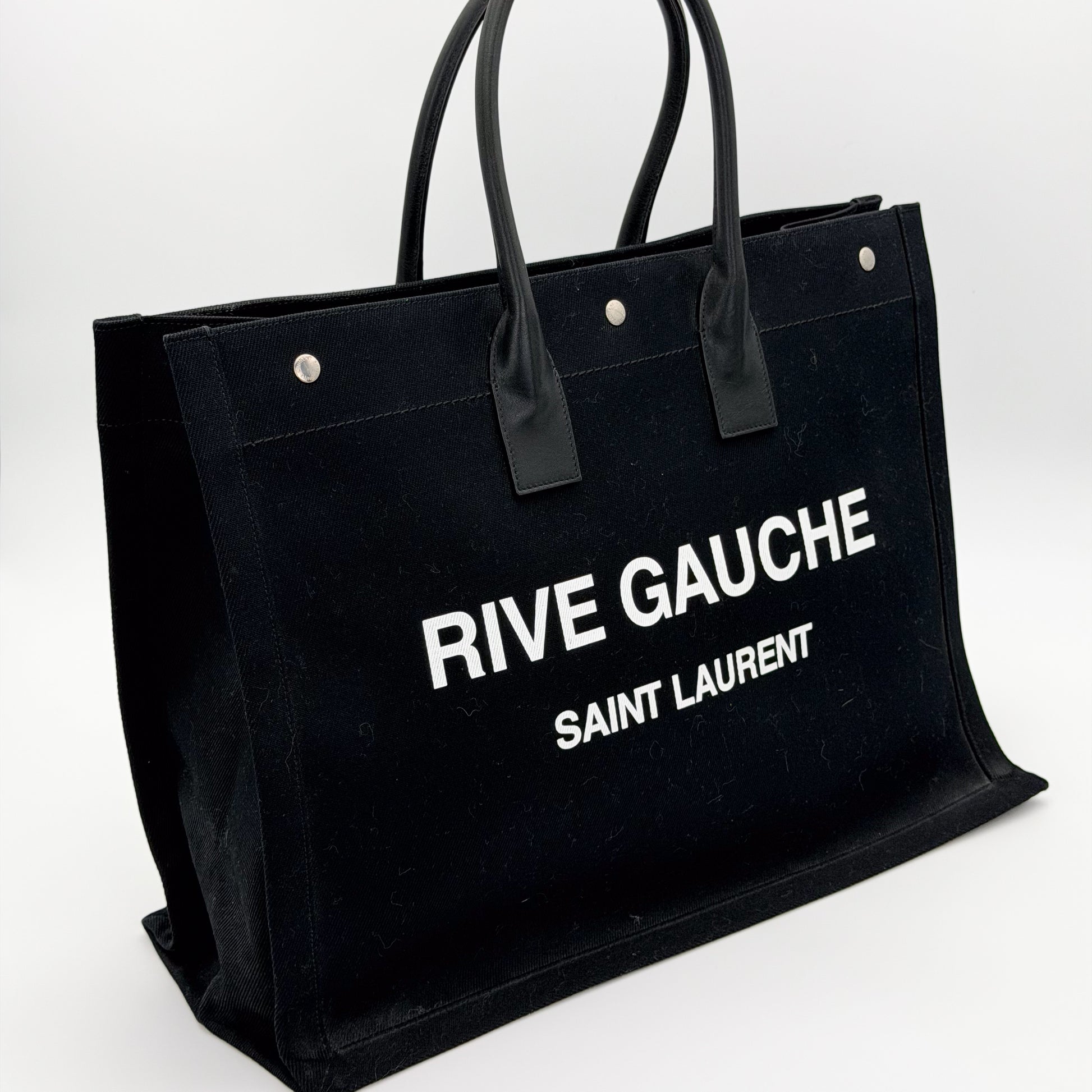 Saint Laurent Rive Gauche tote angled front view with wordmark