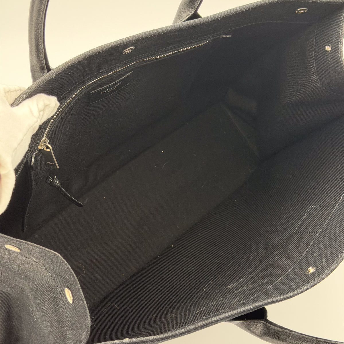 Saint Laurent tote interior zip pocket detail