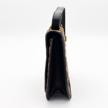 Saint Laurent Spontini bag, side view showing depth