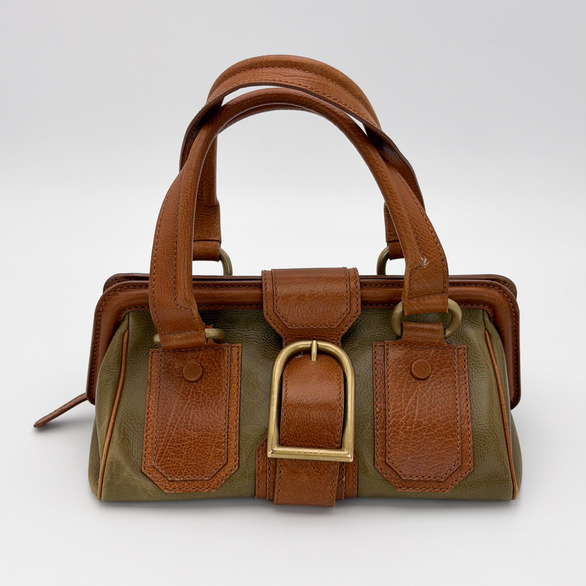 Vintage Celine Ella satchel hardware close up showing Celine engraved buckle