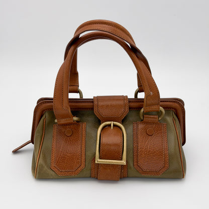 Vintage Celine Ella satchel hardware close up showing Celine engraved buckle