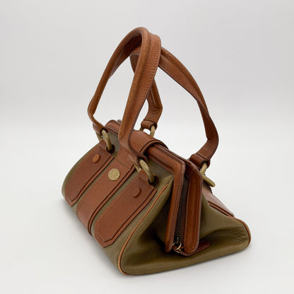 Vintage Celine Ella satchel zip pull close up with gold logo charm