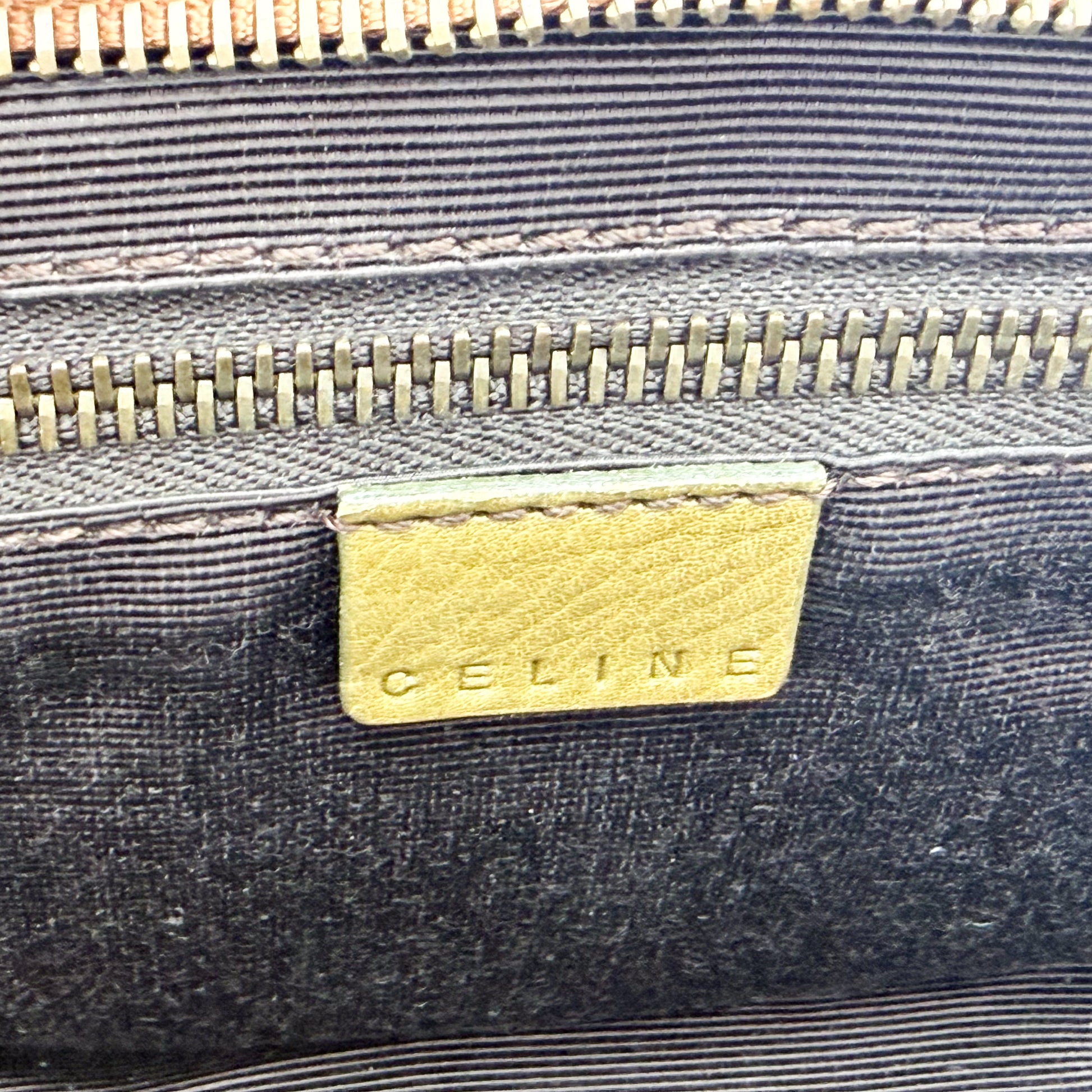 Second hand Celine Ella satchel interior view showing lining and hardware