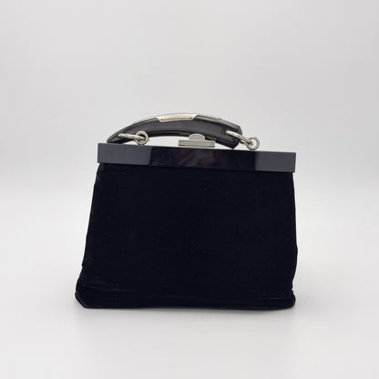 Preloved YSL Mombasa bag interior view showing frame closure and lining
