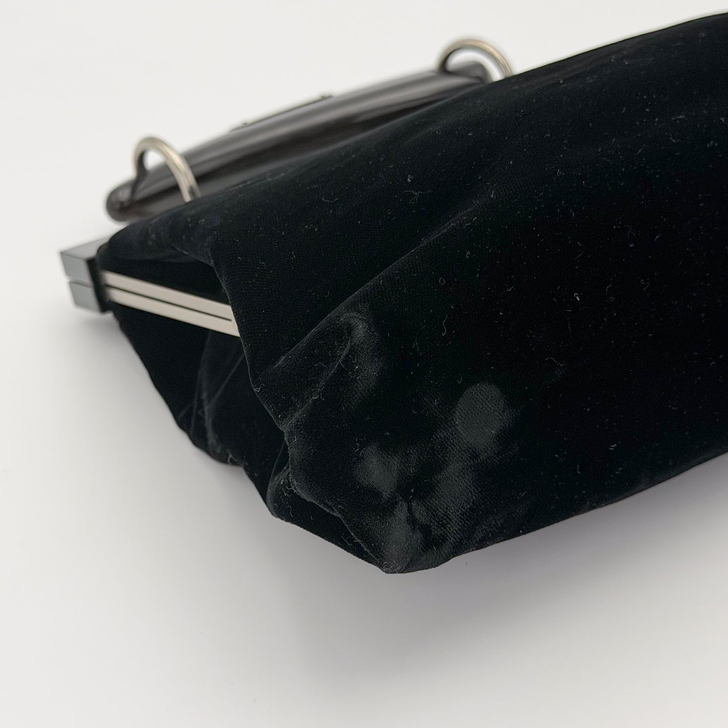 Vintage YSL Mombasa bag base view showing wear to velvet